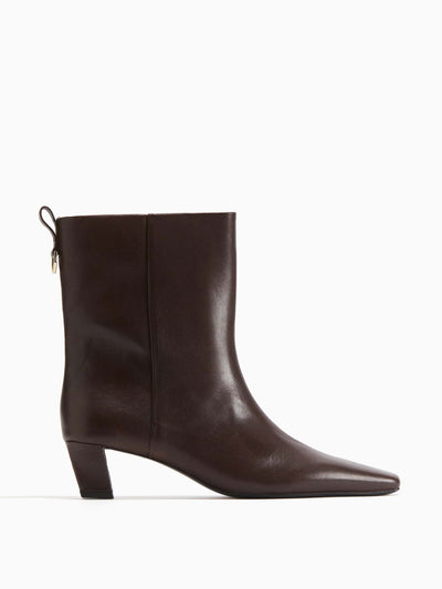 H&M Heeled leather boots at Collagerie