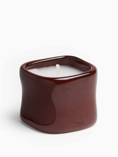 H&M Home Scented candle in a ceramic holder at Collagerie