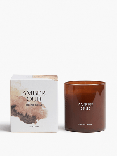 H&M Home Scented candle in a glass holder at Collagerie