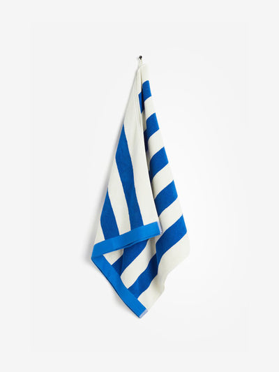 H&M Home Blue striped beach towel at Collagerie