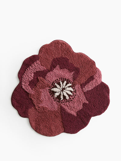 H&M Home Tufted flower-shaped bath mat at Collagerie