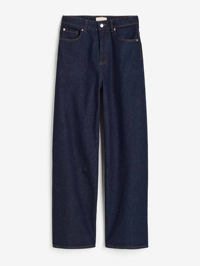 H&M Dark denim wid-leg jeans at Collagerie