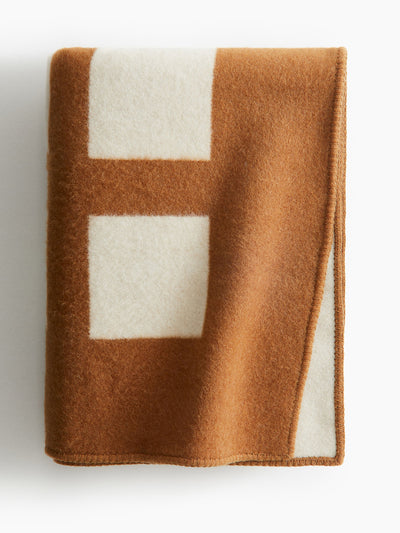 H&M Home Wool-blend blanket at Collagerie