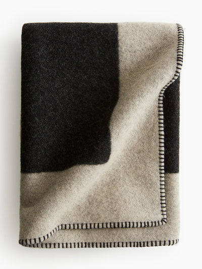 H&M Home Wool-blend blanket at Collagerie