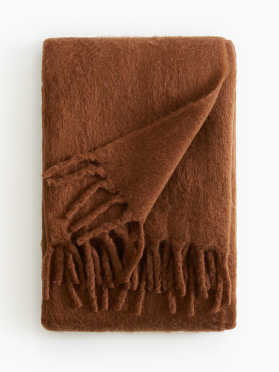 H&M Home Wool-blend blanket at Collagerie