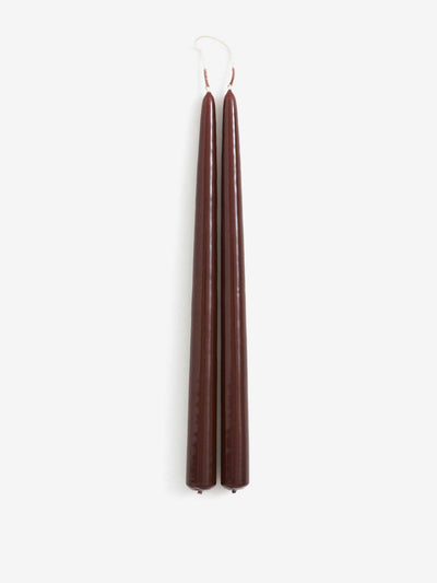 H&M Home Brown tapered candles (2-pack) at Collagerie