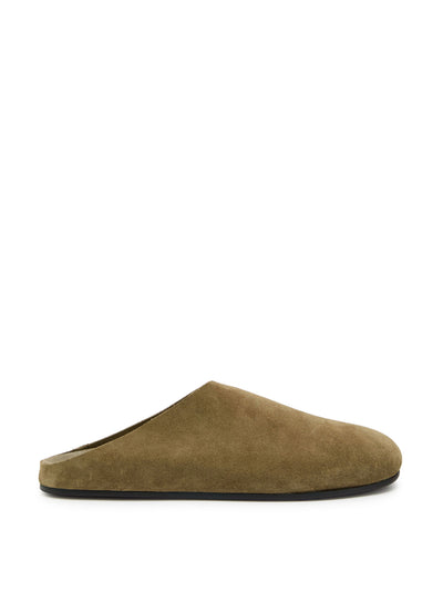 The Row Hudson suede sliders at Collagerie