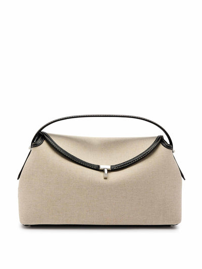 Totême T-Lock canvas top handle bag at Collagerie