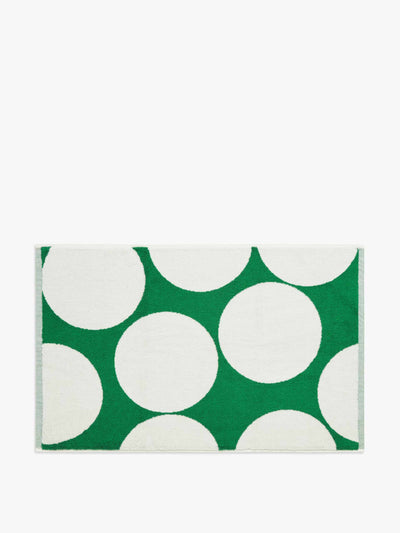 Anyday Green and white polka dot bath mat at Collagerie