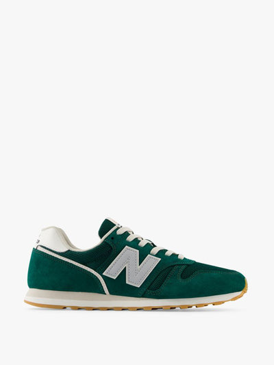 New Balance 373 trainers in green at Collagerie