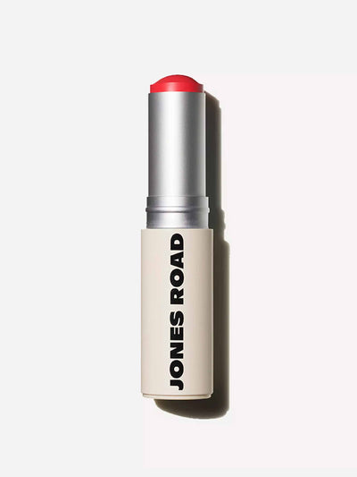 Jones Road Lip and cheek stick in bright coral at Collagerie