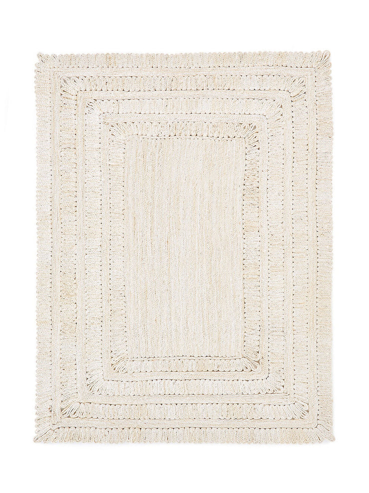White woven jute rug Collagerie
