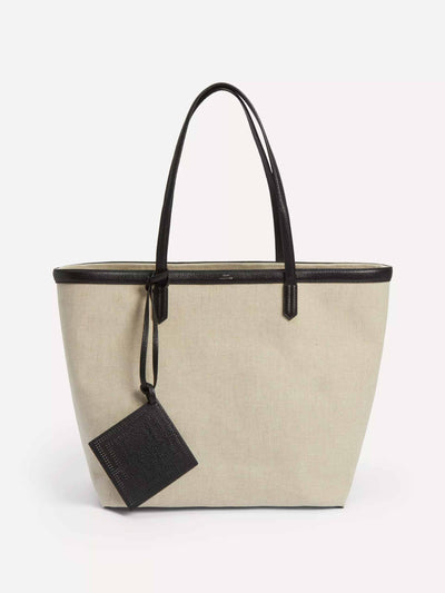 Totême Canvas travel tote bag at Collagerie