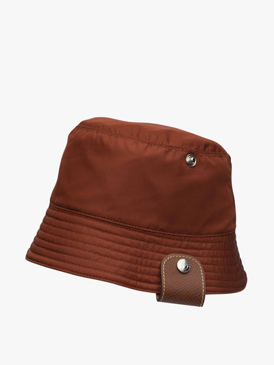 Longchamp Reversible bucket hat in chestnut/tomato at Collagerie