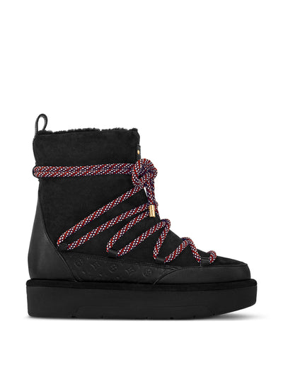 Louis Vuitton Black platform ankle boots at Collagerie