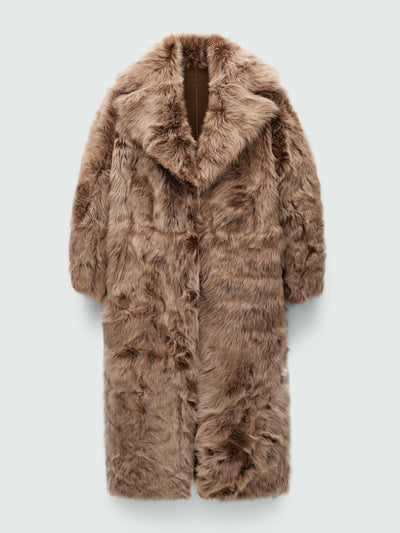 Mango Reversible 100% fur coat at Collagerie