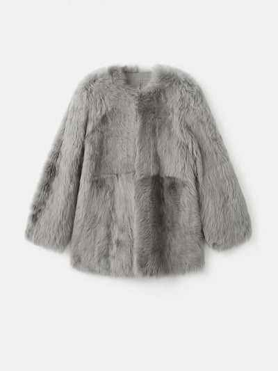 Mango Reversible fur coat at Collagerie