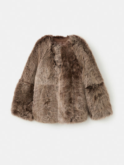 Mango Reversible fur coat at Collagerie