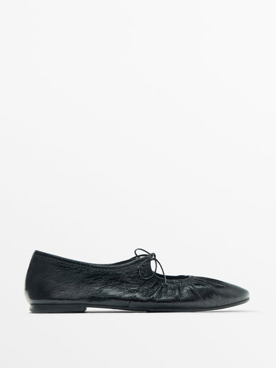 Massimo Dutti Tied leather ballet flats at Collagerie