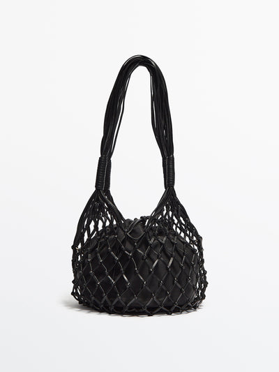 Massimo Dutti Black leather woven bag at Collagerie