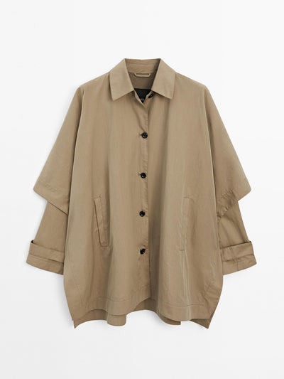 Massimo Dutti Cape trench coat with long sleeves at Collagerie