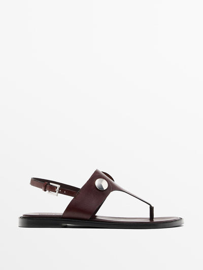 Massimo Dutti Flat sandals with buttons at Collagerie