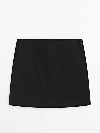 Massimo Dutti 100% linen mini skirt with pockets at Collagerie