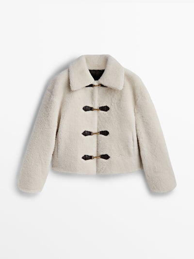 Massimo Dutti Short curly mouton coat at Collagerie