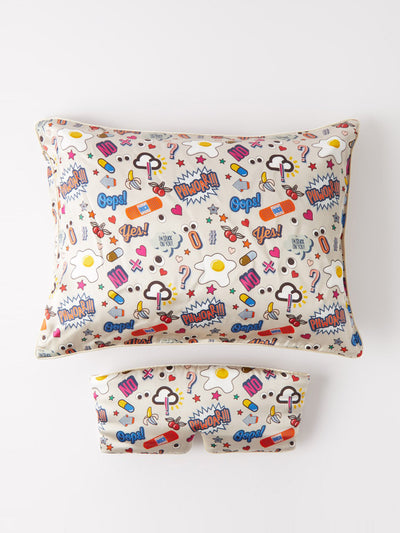 Anya Hindmarch All Over Stickers silk pillow and eye mask at Collagerie