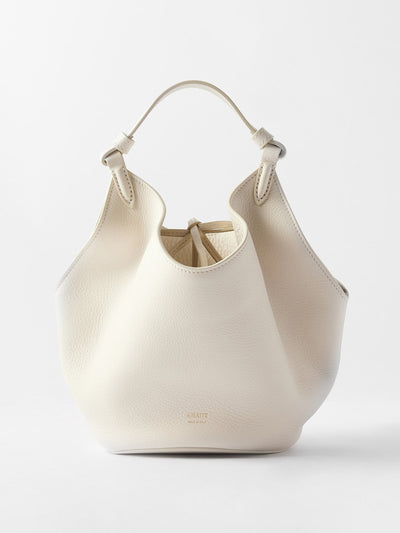 Khaite Lotus mini leather handbag in Ivory at Collagerie
