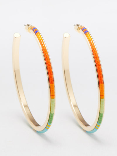 Roxanne Assoulin Beaded hoop earrings at Collagerie