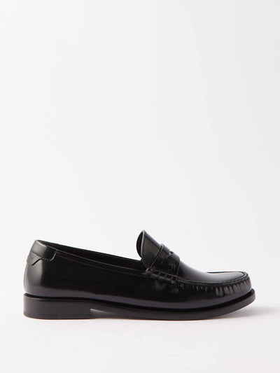 Saint Laurent Black penny loafers at Collagerie