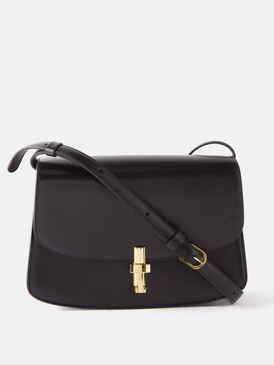 The Row Black leather cross-body bag at Collagerie