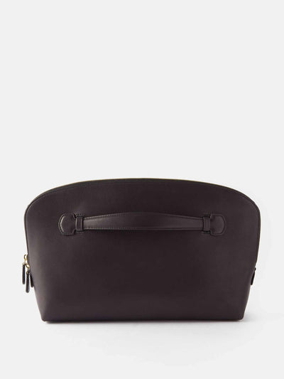 The Row Grained leather clutch bag at Collagerie