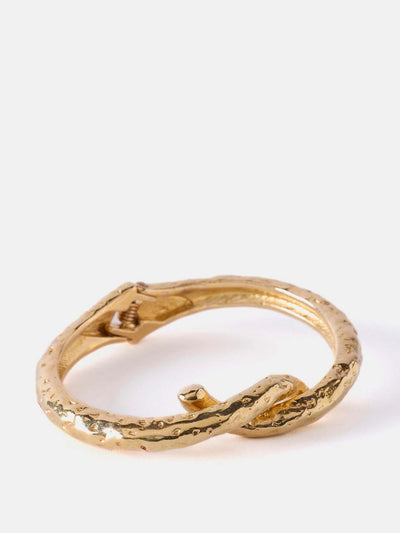 Mint Velvet Gold tone twisted bangle at Collagerie
