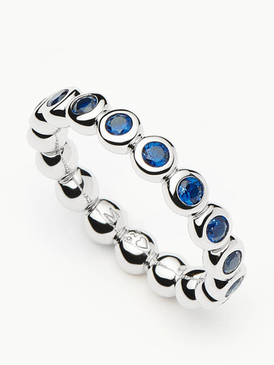 Missoma Tennis eternity stacking ring in sterling silver and sapphire blue nano crystal at Collagerie