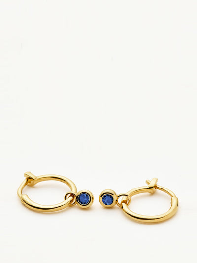Missoma Tennis mini charm hoop earrings in gold vermeil and sapphire blue nano crystal at Collagerie