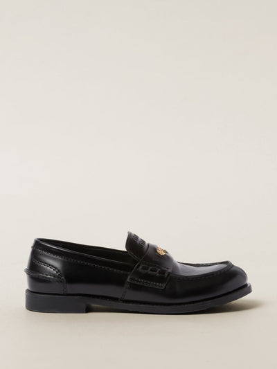 Miu Miu Brushed leather penny loafers at Collagerie