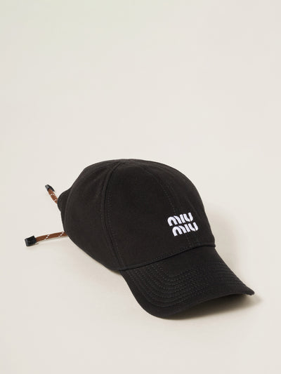Miu Miu Denim baseball cap at Collagerie