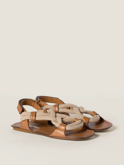 Miu Miu Flat cord sandals at Collagerie