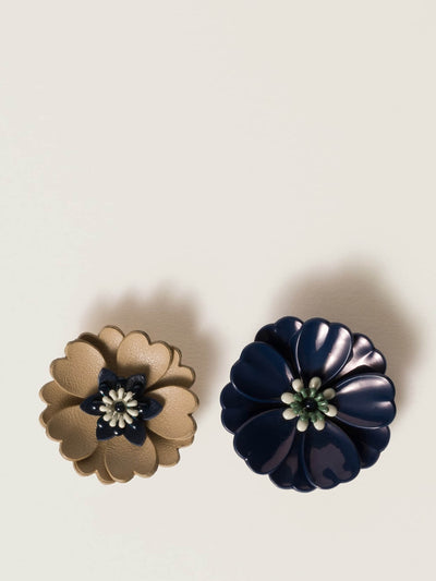 Miu Miu Metal and leather earrings at Collagerie