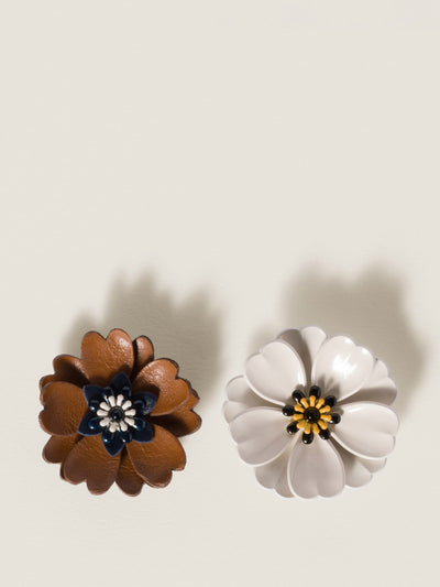 Miu Miu Metal and leather earrings at Collagerie