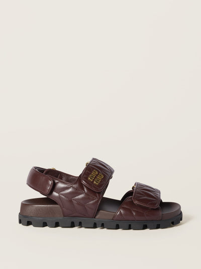 Miu Miu Sporty matelassé nappa leather sandals at Collagerie