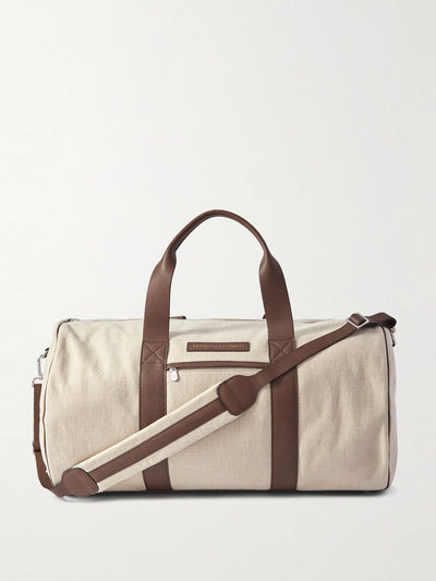 Brunello Cucinelli Leather-trimmed canvas weekend bag at Collagerie