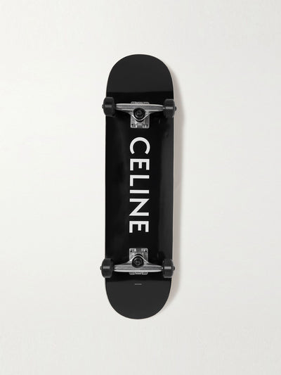 Celine Logo-print wooden skateboard at Collagerie