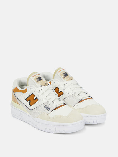 New Balance 550 leather sneakers in white and orange at Collagerie