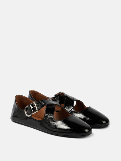 Alaïa Criss Cross patent leather ballet flats at Collagerie