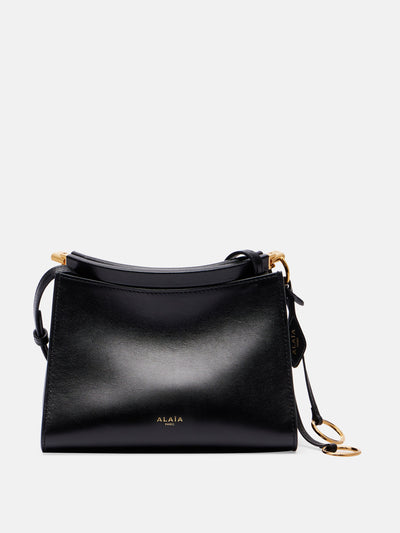 Alaïa Le Click Small leather shoulder bag at Collagerie