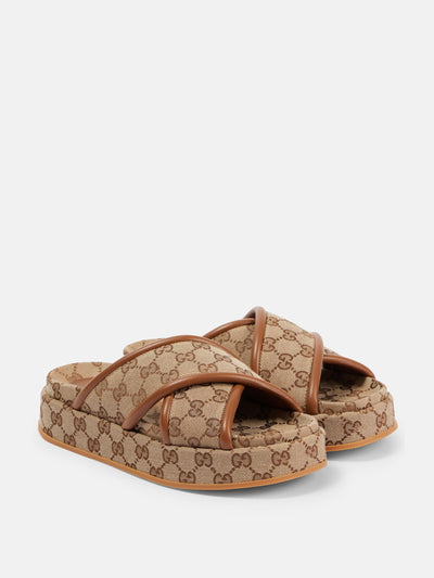 Gucci Clarice GG canvas slides at Collagerie