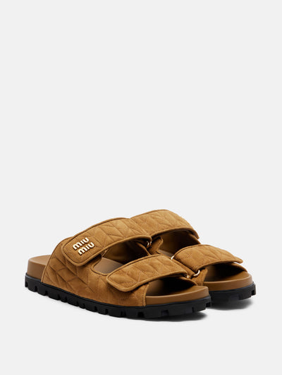 Miu Miu Quilted suede slides at Collagerie